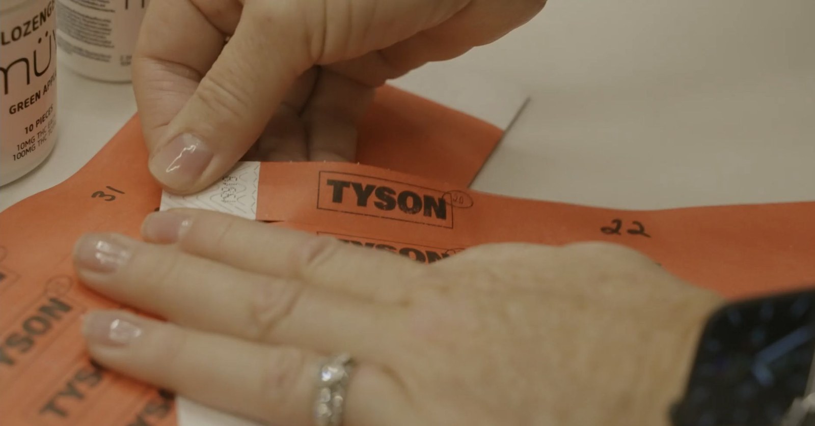 Tyson 2.0 event wristbands shown in the highlight film