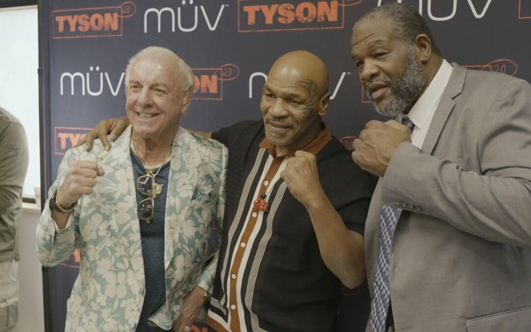 Mike Tyson posing at the Tyson 2.0 Florida tour event